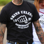 »Skins Uelzen«-T-Shirt beim RechtsRock-Konzert in Nienhagen